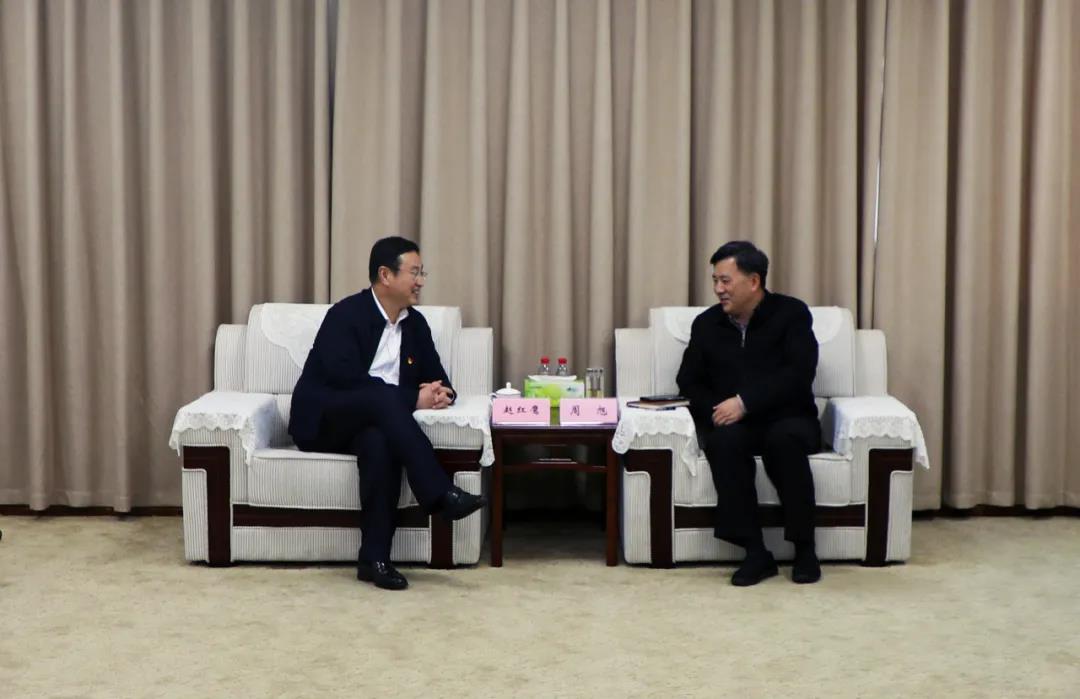 赵红鹰拜会重庆市北碚区委书记周旭
