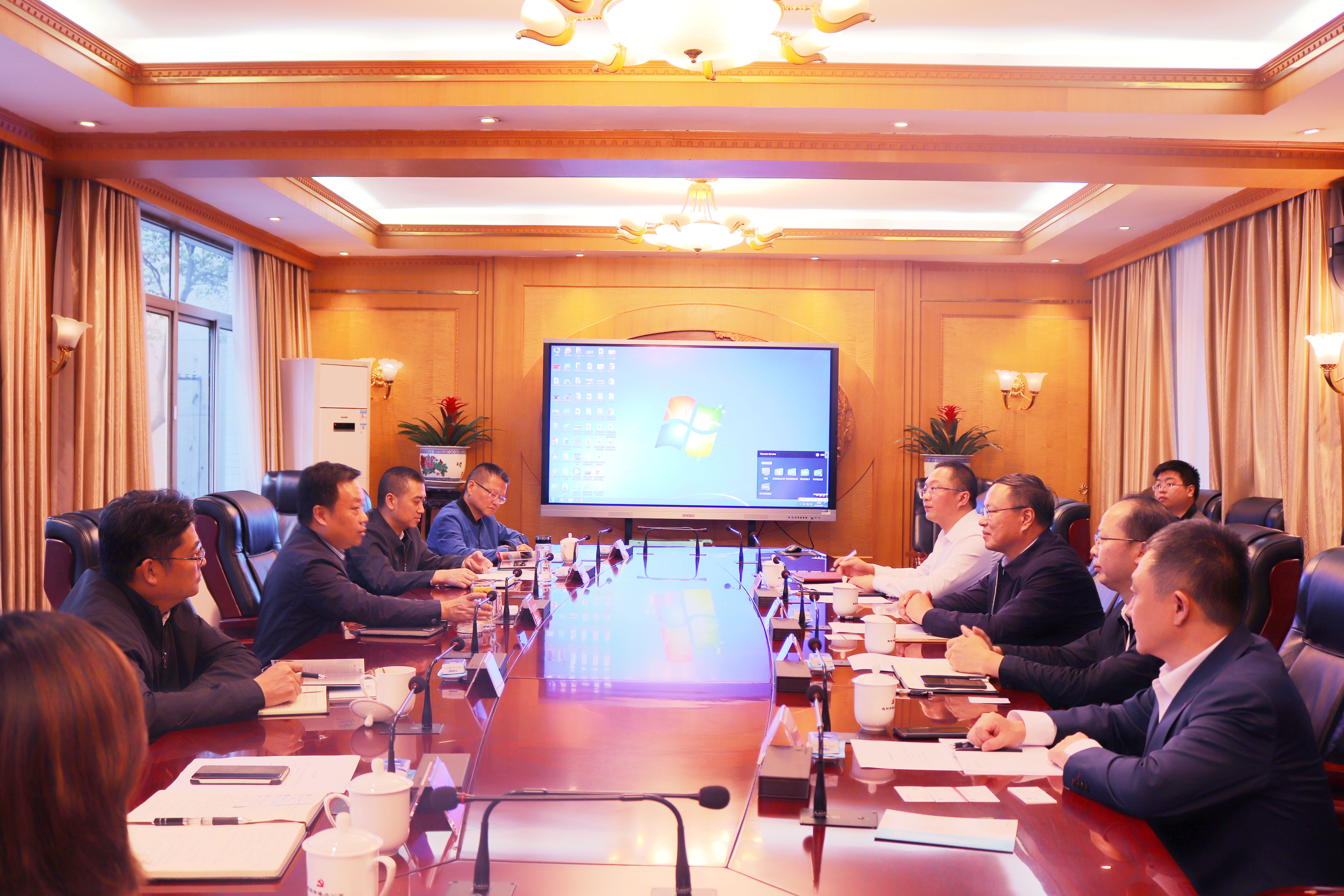 徐鹏程与刘国栋拜会德阳市市委、市政府主要领导