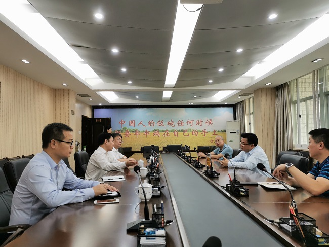 陈礼松到自治区粮食和物资储备局洽谈合作事宜