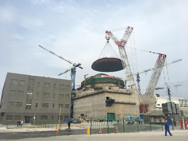 中核二四公司承建的华龙一号全球示范工程福清核电6号机组外穹顶吊装完成