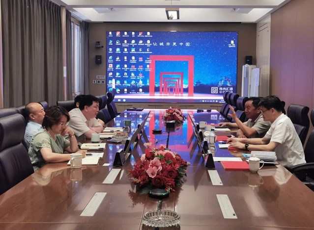 金宁运会见伟光汇通公司董事长陆学伟