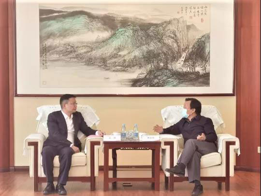 石雨一行拜访中青旅控股董事长康国明