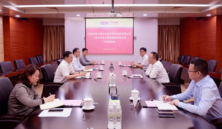 康虎和中国市政工程东北设计研究总院有限公司党委副书记、总经理李祝龙会谈
