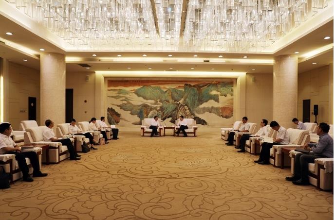 潘必义拜会西安高新区党工委副书记、管委会主任齐海兵