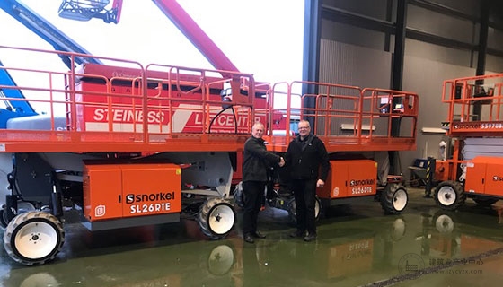 Karsten-Haahr,-of-KH-Lift-ApS-(left)-hands-over-the-Electric-Speed-Levels-to-Poul-Steiness-(right)-of-Steiness-Liftcenter-ApS-in-Denmark.jpg