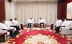 宋海良拜会海口市委书记何忠友